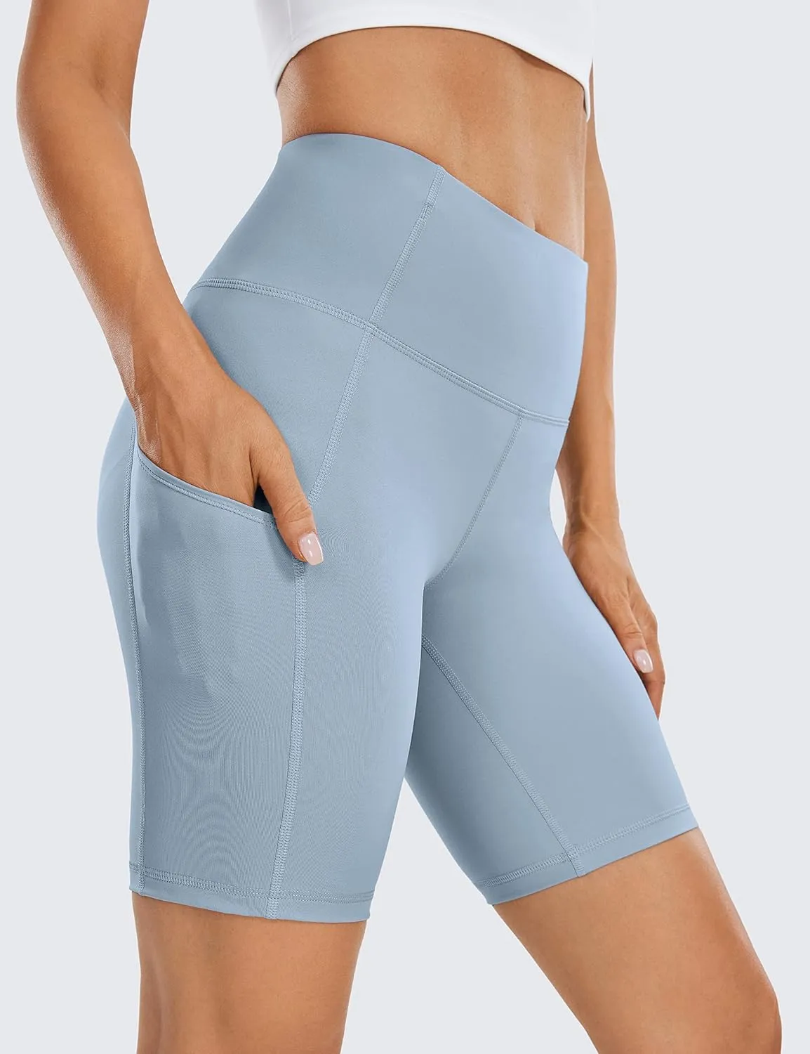 CRZ YOGA Womens Naked Feeling Light Biker Shorts with Pockets 8 Inches - High Waisted Workout Athletic Running Yoga Shorts